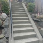 Outdoor concrete stairs with railing